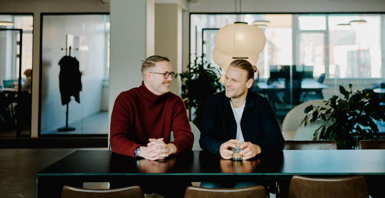 Christian Højbo Møller and Mikkel Sloth, Zoios co-founders, sharing a coffee at the office